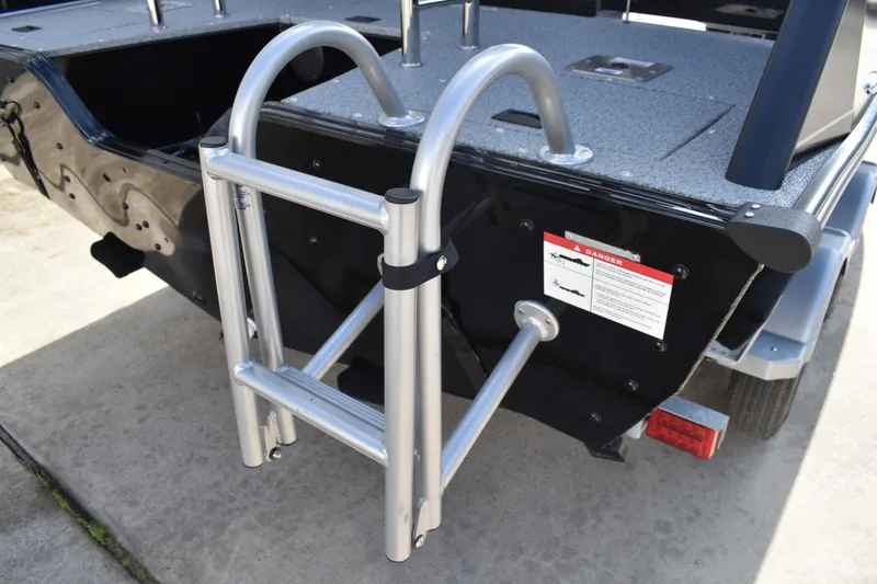 Slide: The Image of 2026 Lowe Sport Deck 224 boat ladder and rear deck detail. - 7