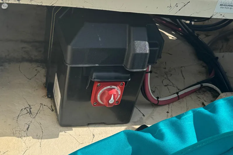 Slide: The Image of Battery box with switch in a 2000 Carolina Skiff Semi-V 1980 boat. - 10