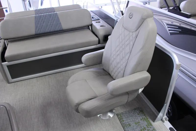 Slide: The Image of 2022 Premier Intrigue 230 Bed boat interior with plush seating and modern design. - 20