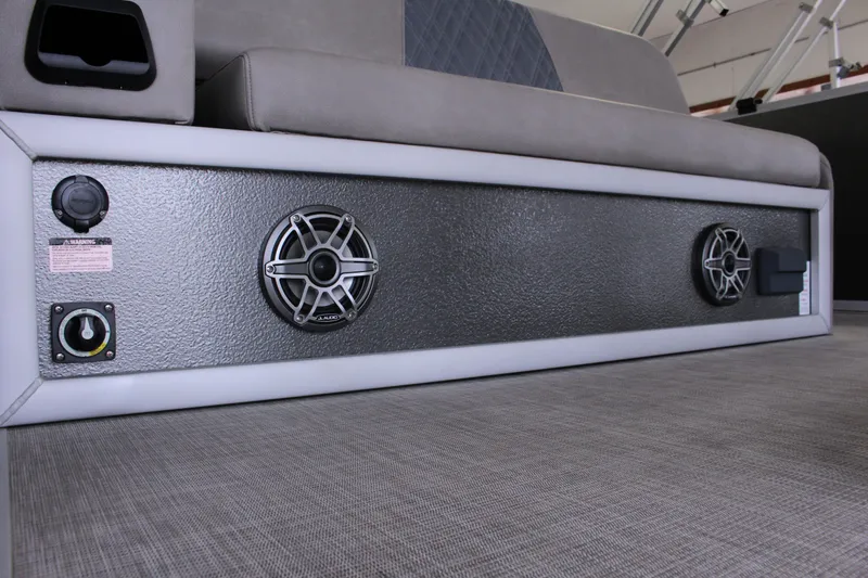 Slide: The Image of 2022 Premier Intrigue 230 Bed with integrated speakers and control panel. - 4