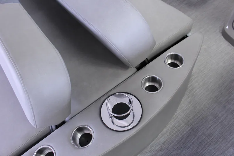 Slide: The Image of 2022 Premier Intrigue 230 Bed with multiple cup holders and sleek design. - 6