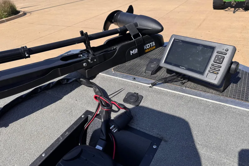 Slide: The Image of 2013 Tracker Pro165 boat with Garmin fishfinder and Minn Kota Maxxum trolling motor. - 5