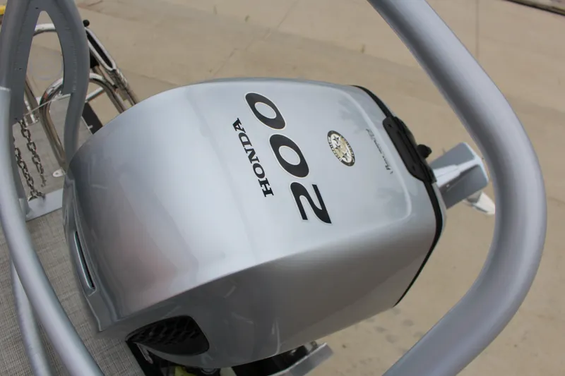 Slide: The Image of Honda 200 outboard motor on 2022 Premier Sunsation 230 boat. - 13