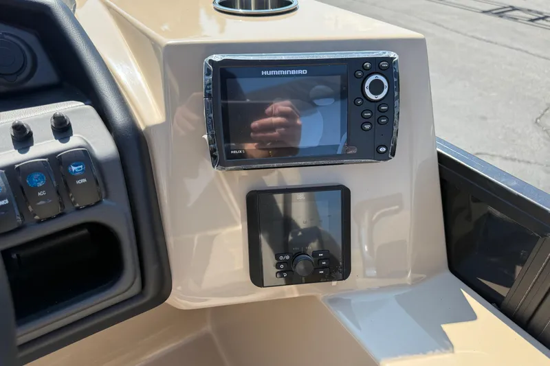 Slide: The Image of 2026 Bentley Pontoons Legacy 200 Navigator dashboard with Humminbird and JBL controls. - 16