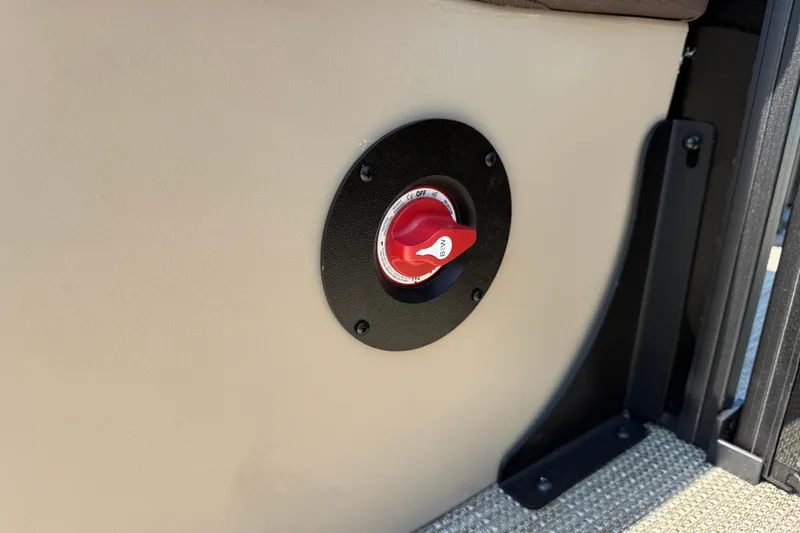 Slide: The Image of Red switch on 2026 Bentley Pontoons Legacy 200 Navigator interior panel. - 20