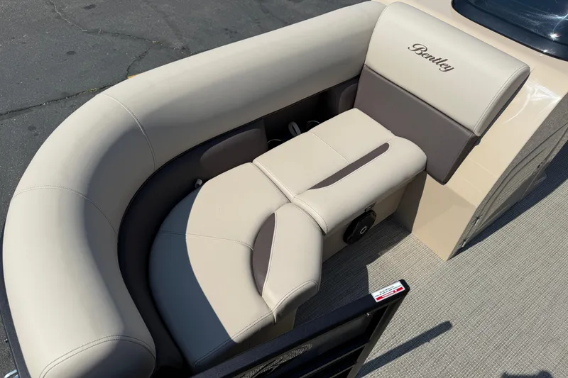 Slide: The Image of Luxurious seating on 2026 Bentley Pontoons Legacy 200 Navigator boat. - 8