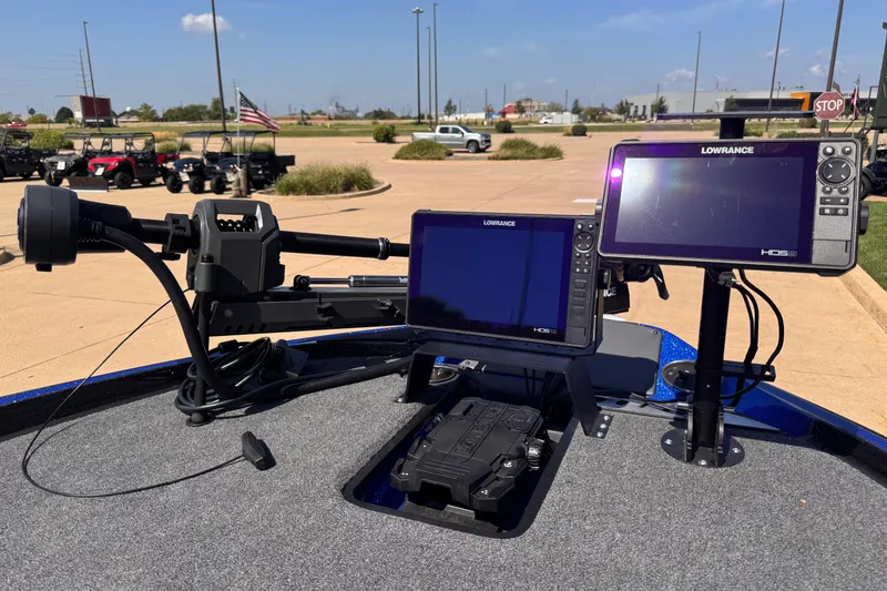 Slide: The Image of 2023 Triton 21TRXP boat dashboard with Lowrance HDS displays and trolling motor. - 3