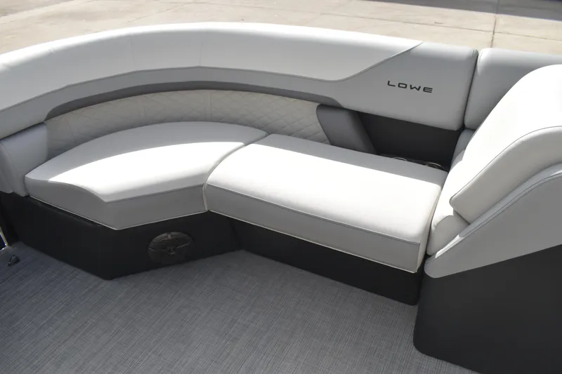 Slide: The Image of 2026 Lowe SS 210 boat interior with sleek, modern seating design. - 13