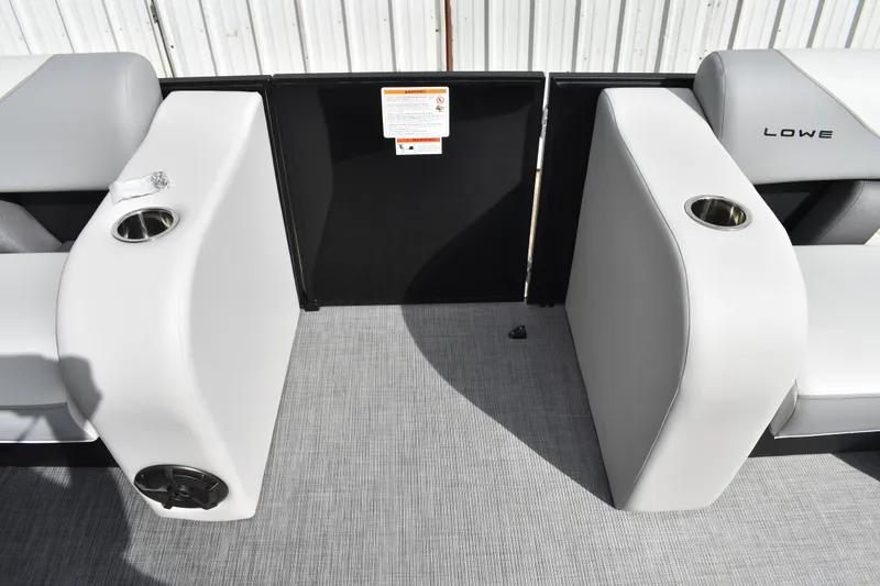 Slide: The Image of 2026 Lowe SS 210 boat interior with cup holders and seating. - 15