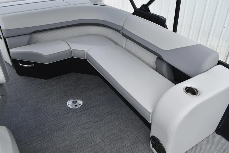 Slide: The Image of Luxurious seating in 2026 Lowe SS 210 boat with modern upholstery and cup holder. - 18