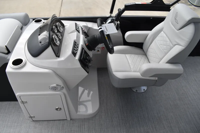 Slide: The Image of 2026 Lowe SS 210 boat interior with modern helm and luxurious captain's chair. - 19