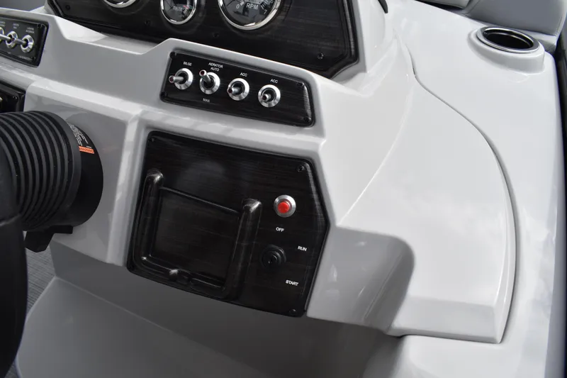 Slide: The Image of Dashboard of 2026 Lowe SS 210 boat with controls and gauges. - 26