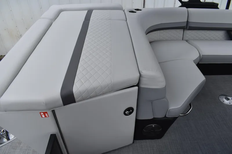 Slide: The Image of Luxurious seating on 2026 Lowe SS 210 pontoon boat with quilted upholstery. - 29
