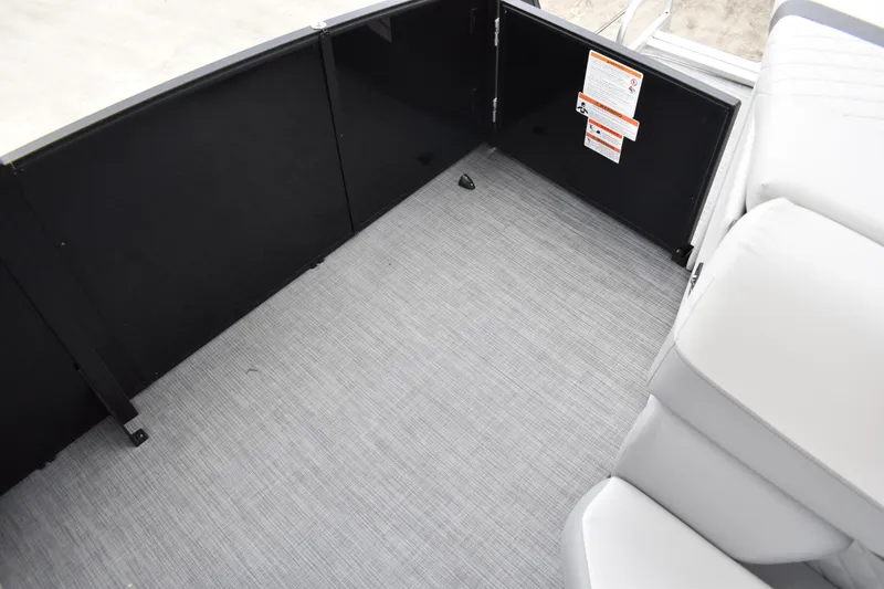 Slide: The Image of Interior of 2026 Lowe SS 210 boat with gray flooring and seating. - 31