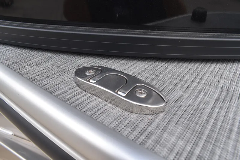 Slide: The Image of Stainless steel cleat on 2026 Lowe SS 210 boat deck. - 5