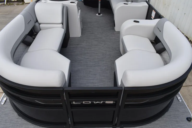 Slide: The Image of 2026 Lowe SS 210 pontoon boat interior with gray seating and modern design. - 8
