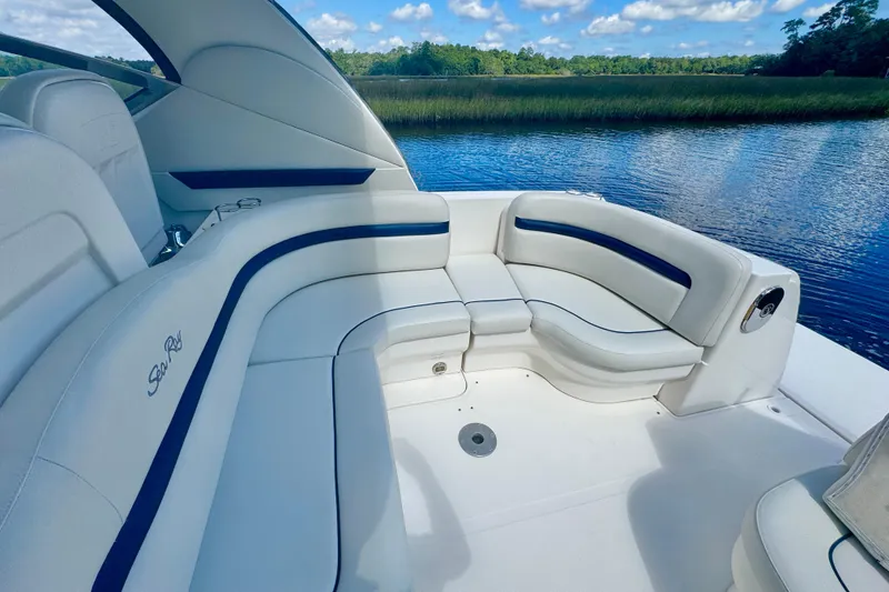 Slide: The Image of Luxurious seating on 2010 Sea Ray 390 Sundancer yacht, with scenic water view. - 11