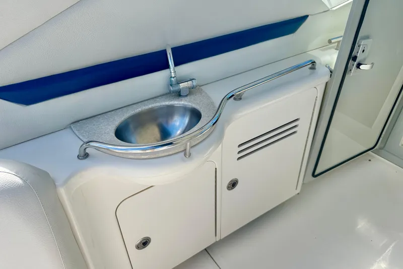 Slide: The Image of Interior sink area on a 2010 Sea Ray 390 Sundancer yacht. - 14