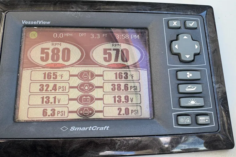 Slide: The Image of SmartCraft VesselView display on 2010 Sea Ray 390 Sundancer showing engine metrics. - 20