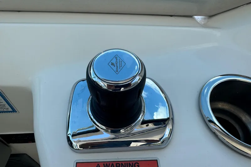 Slide: The Image of Joystick control on 2010 Sea Ray 390 Sundancer boat dashboard. - 22