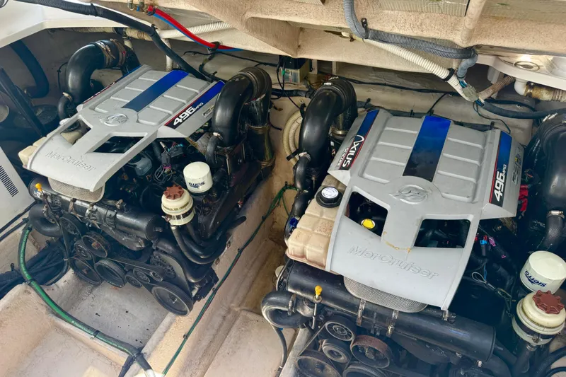 Slide: The Image of Engine room of 2010 Sea Ray 390 Sundancer with twin MerCruiser 496 engines. - 43