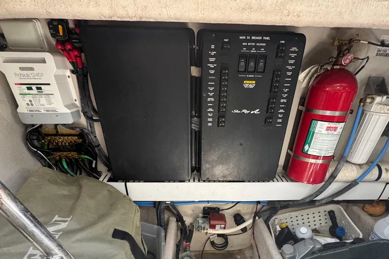 Slide: The Image of Engine room of 2010 Sea Ray 390 Sundancer with electrical panel and fire extinguisher. - 45