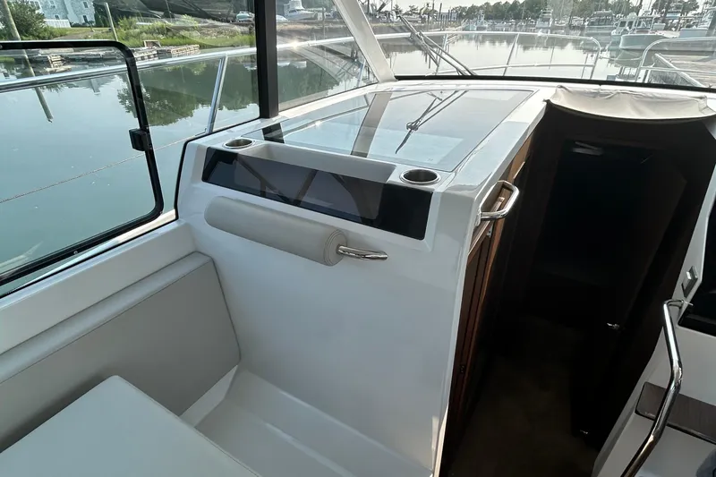 Slide: The Image of Interior view of 2022 Beneteau Antares 11 boat, featuring sleek design and modern amenities. - 13