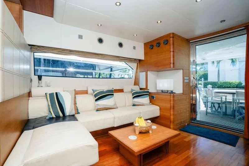 Slide: The Image of Luxurious 2006 Aicon Flybridge yacht interior with modern seating and elegant decor. - 60