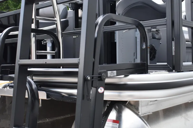 Slide: The Image of Luxurious seating in 2026 Lowe LF 232 boat, featuring sleek gray upholstery. - 11