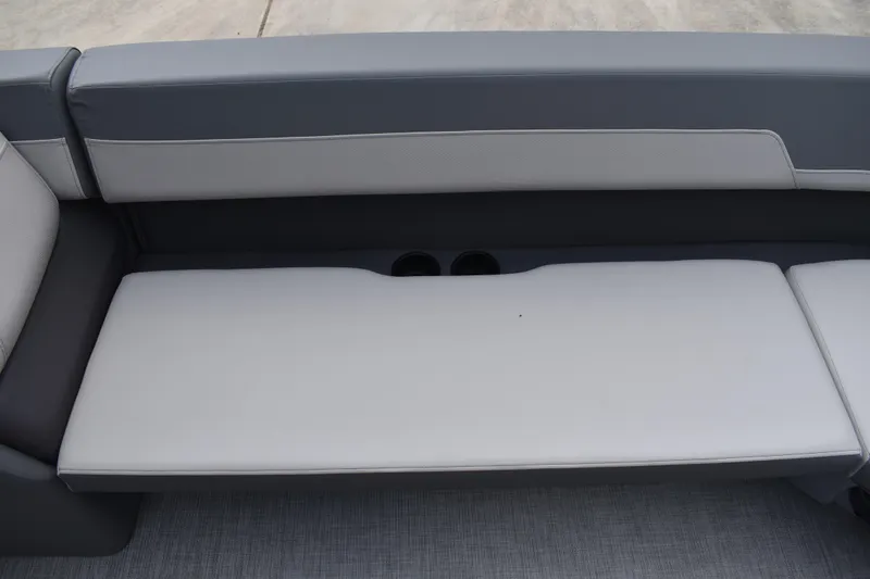 Slide: The Image of 2026 Lowe LF 232 boat interior with sleek gray seating and modern design. - 18