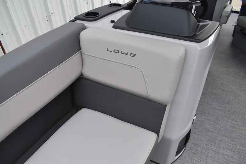 Slide: The Image of Control panel of 2026 Lowe LF 232 boat with AquaAmp and switches. - 25