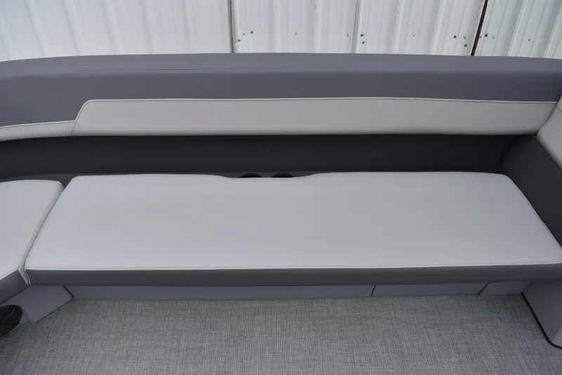 Slide: The Image of Kicker media center in 2026 Lowe LF 232 boat dashboard, featuring control buttons. - 26