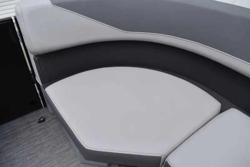 Slide: The Image of Interior of 2026 Lowe LF 232 boat with gray seating and steering console. - 28