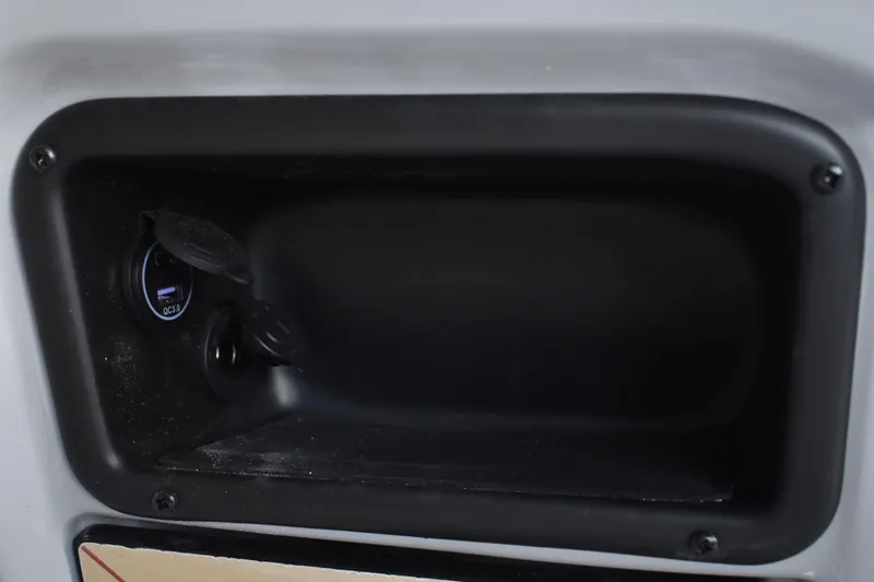 Slide: The Image of Lowe LF 232 boat storage compartment with measurement markings, 2026 model. - 39