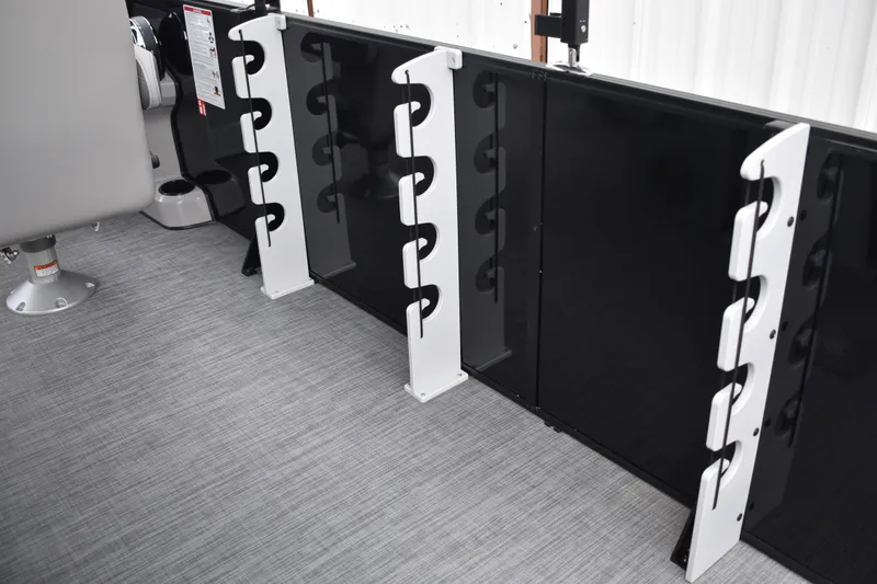 Slide: The Image of Gray boat seat on Lowe LF 232, 2026 model, with railing and deck view. - 45