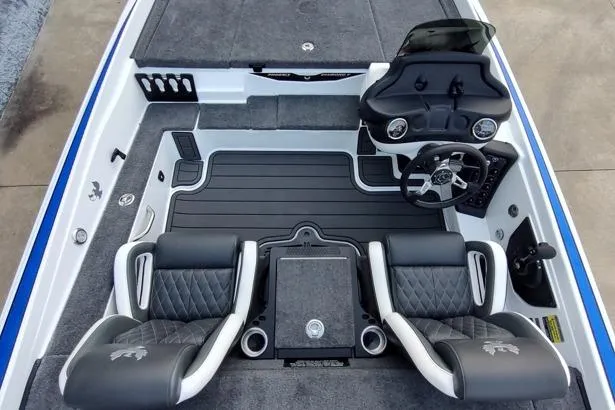 Slide: The Image of 2026 Phoenix 721zxl boat interior with dual seats, steering console, and modern design. - 7