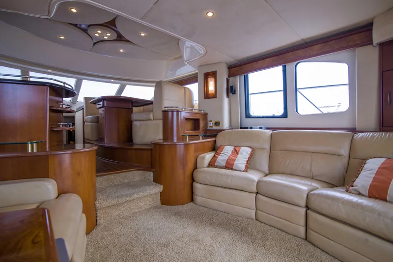 Slide: The Image of Luxurious interior of 2009 Silverton Oviation 52 yacht with plush seating and elegant wood finishes. - 35