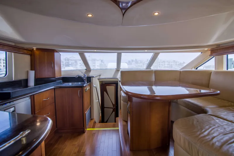 Slide: The Image of Luxurious interior of 2009 Silverton Oviation 52 yacht with elegant wood finishes. - 38