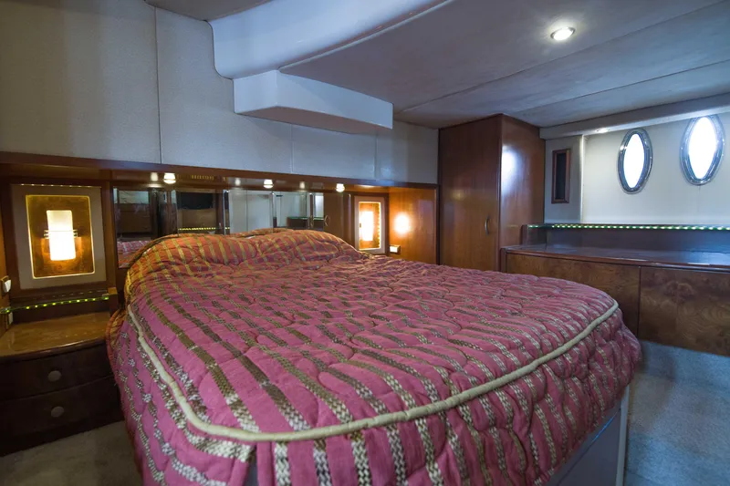 Slide: The Image of Luxurious bedroom interior of 2009 Silverton Oviation 52 yacht with elegant decor. - 51