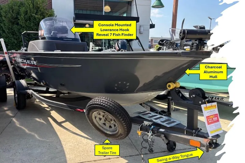 Slide: The Image of 2022 Tracker PGV16 boat with charcoal aluminum hull, fish finder, and trailer. - 6
