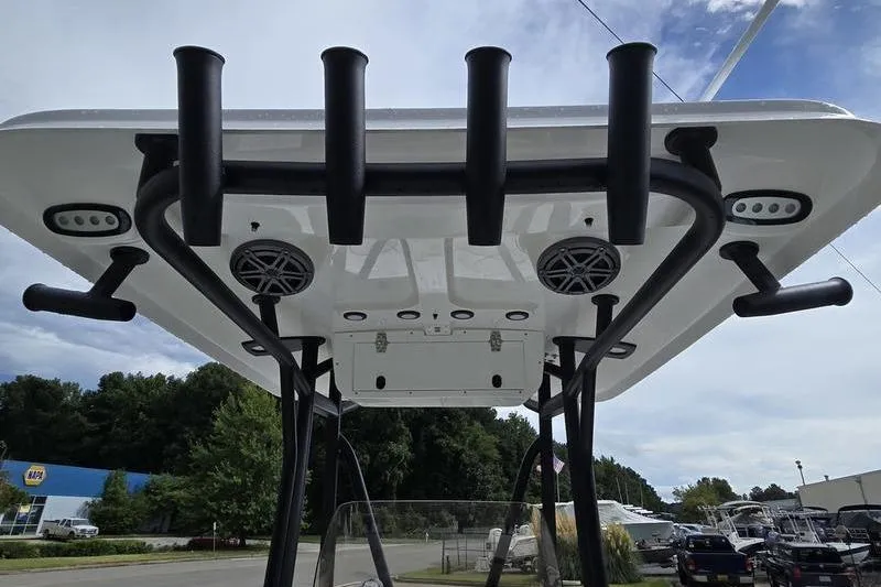 Slide: The Image of 2026 Sea Hunt BX 22 BR boat T-top with rod holders and speakers. - 14