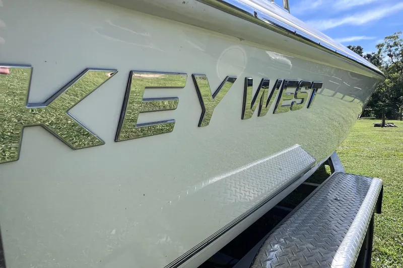 Slide: The Image of 2020 Key West 230 Bay Reef boat on trailer, side view. - 18