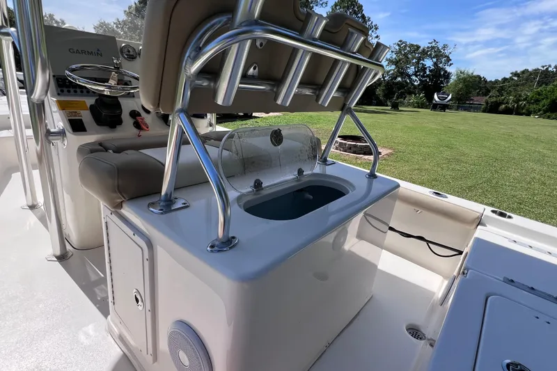 Slide: The Image of 2020 Key West 230 Bay Reef boat interior with Garmin system and seating. - 31
