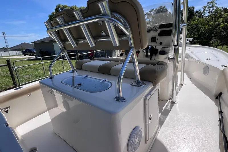 Slide: The Image of 2020 Key West 230 Bay Reef boat interior with seating and control panel. - 32