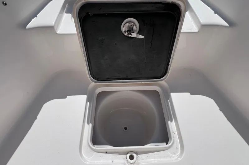 Slide: The Image of Open storage compartment on a 2020 Key West 230 Bay Reef boat. - 39
