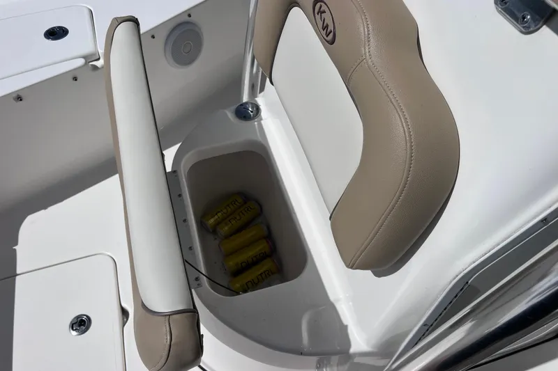 Slide: The Image of 2020 Key West 230 Bay Reef boat seat with storage compartment containing drinks. - 44