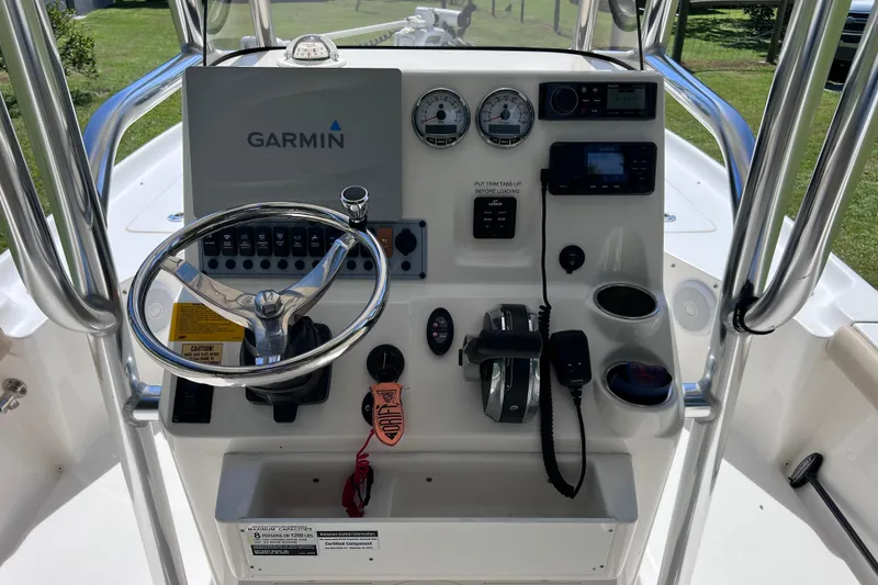 Slide: The Image of 2020 Key West 230 Bay Reef boat console with Garmin navigation and control panel. - 49