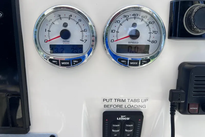 Slide: The Image of Dashboard of a 2020 Key West 230 Bay Reef boat with RPM and speed gauges. - 57
