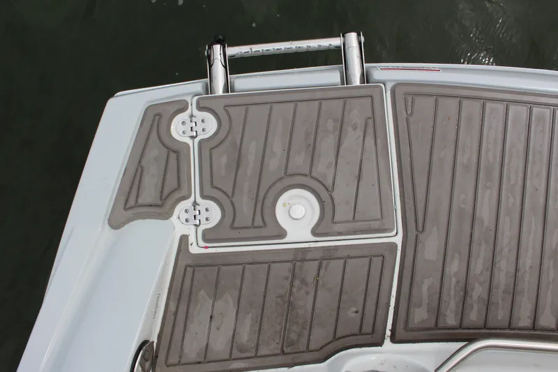 Slide: The Image of 2023 Crownline E235 boat swim platform with textured non-slip surface. - 22