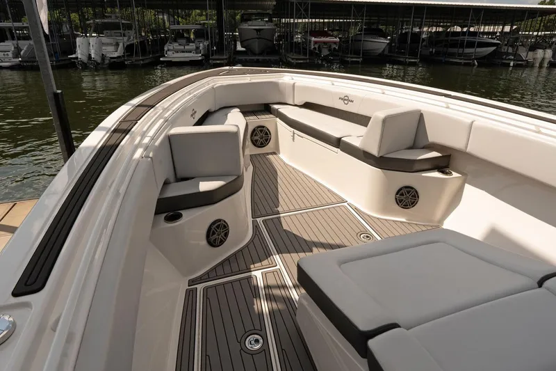 Slide: The Image of 2018 Fountain 38 SCX boat interior with cushioned seating and sleek design. - 26